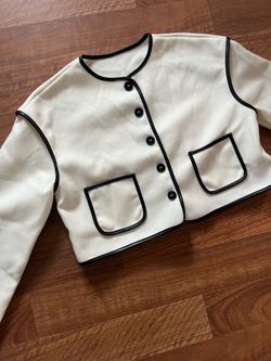 Women’s designer looking blazer coat top