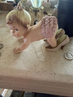 Vintage porcelain bisque piano baby