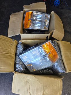 2011 GMC 2500HD crew cab pick up front headlights
