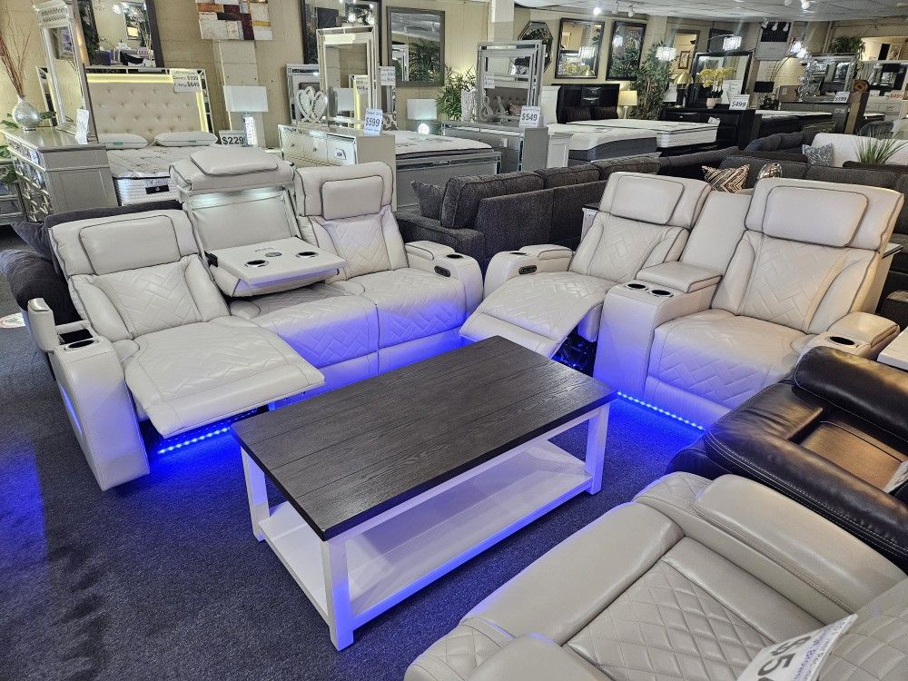 Brand New Biege Synthetic Leather Motorized Reclining Sofa + Loveseat With Power Headrests, Wireless Charging, Cup Holders, Storage, And Blue LED