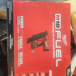 Brand new Milwaukee, nail gun., battery and charger never open.