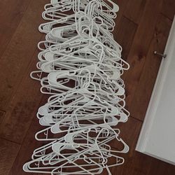 70 White plastic clothes hanger