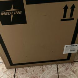 New still-in-box Folding Bedside Commode