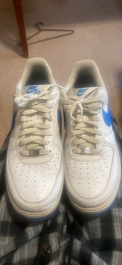 White and blue air force 1’s