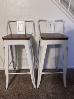 Four swivel barstools