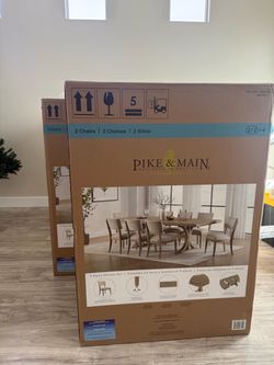 Brand new Costco dining table and chairs