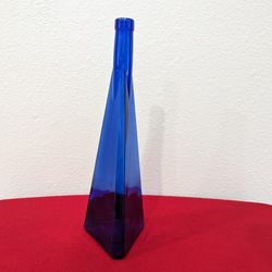 Vintage Triangular Colbalt Blue Bottle/Vase

Decorative 
