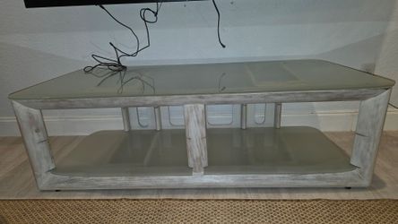 Free.. free.. free...for pick up now...Glass Top TV Stand with Lower Shelf