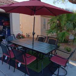 Patio Set Table And 6 Chairs With New Cushions And New Umbrela 