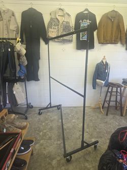 2-tier clothing rack, rolls around smoothly