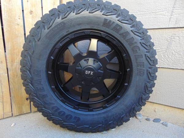 4 18X9 Matte Black Rims 275 70 18 Goodyear Territory M/T *6X135*6X5.5*