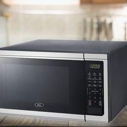 OSTER 1.1 C-ft 1000 Watt Microwave 