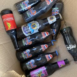 Antique Coke And Pepsi Bottles