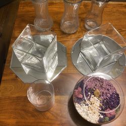 Variety of glass flower vases and plant terrarium 9 items total. 3 round tall vases + 2 short square vases with the 2 mirrors underneath + 1 plant ter