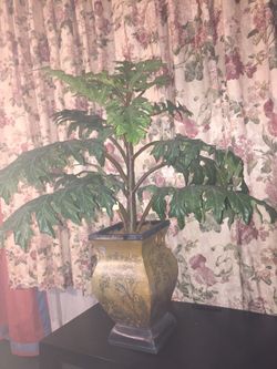 Fake plant in a nice metal pot