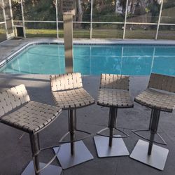 (4) FLOYD GAS LIFT SWIVEL BARSTOOLS  -  MODERN BONDED  - LEATHER SEATS, ADJUSTABLE HEIGHT & 360 DEGREE COMFORT FUNCTIONALITY.