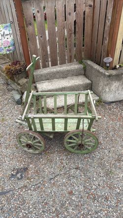 Vintage antique goat wagon from about 1900 yard art works