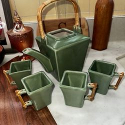 Vintage Joyce Chen green ceramic teapot set with four square teacups and bamboo handles.