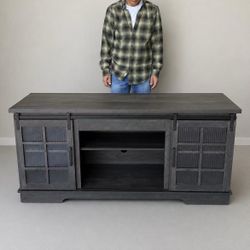 New In Box Dark Grayish Black TV Entertainment Center Stand Furniture Shelf Ideal For Up To 65” Television Sliding Barn Door And Adjustable Shelves 