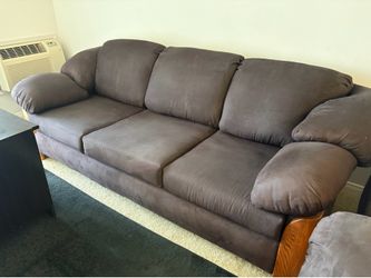 Beautiful couch/loveseat/ottoman paid 3k for new foam/appoulstry
