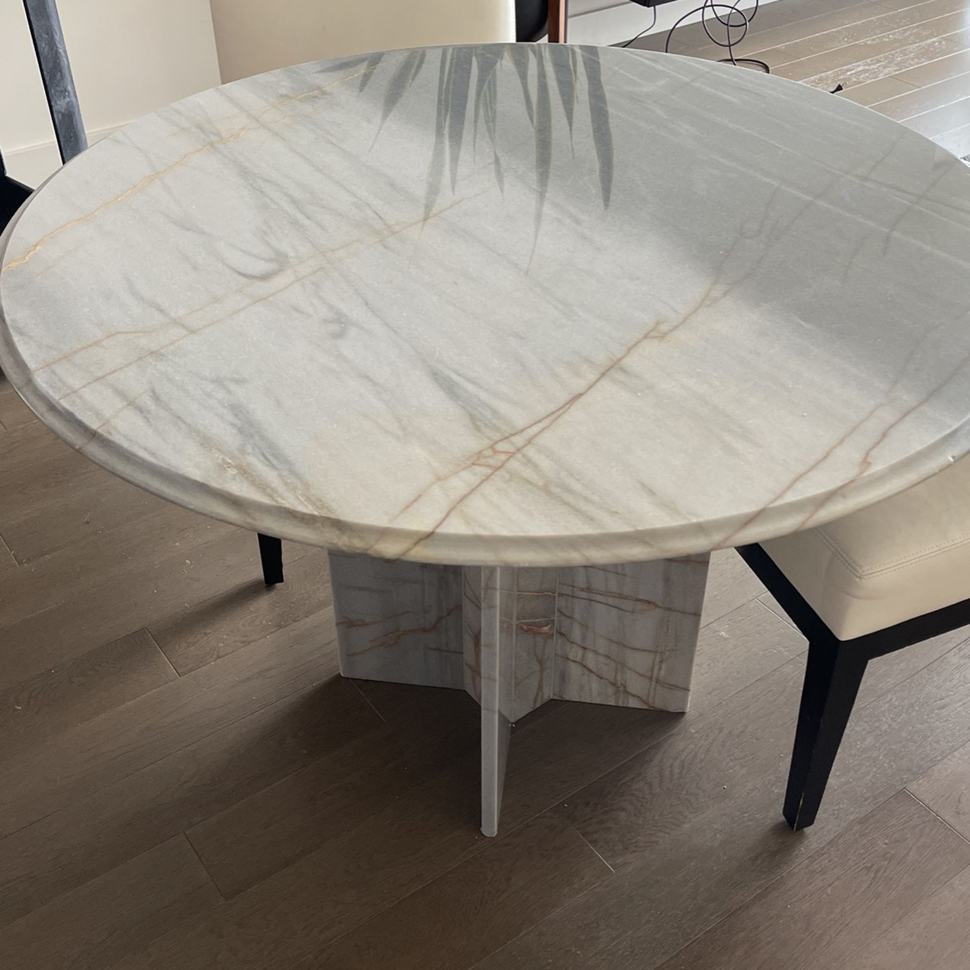 Marble Table And Two Leather Chairs