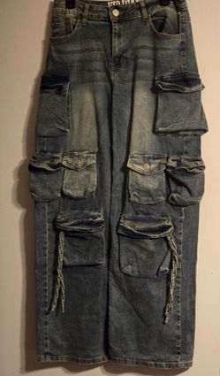 A Pair Of denim jeans with lots of pockets