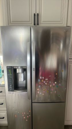 LG 26 cu ft fridge as is