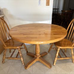 Dining table and two chairs