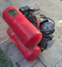 Air compressor with hose