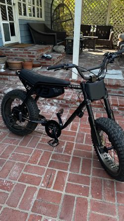 super 73 450 miles back pegs and decal plate and looks new and works perfect