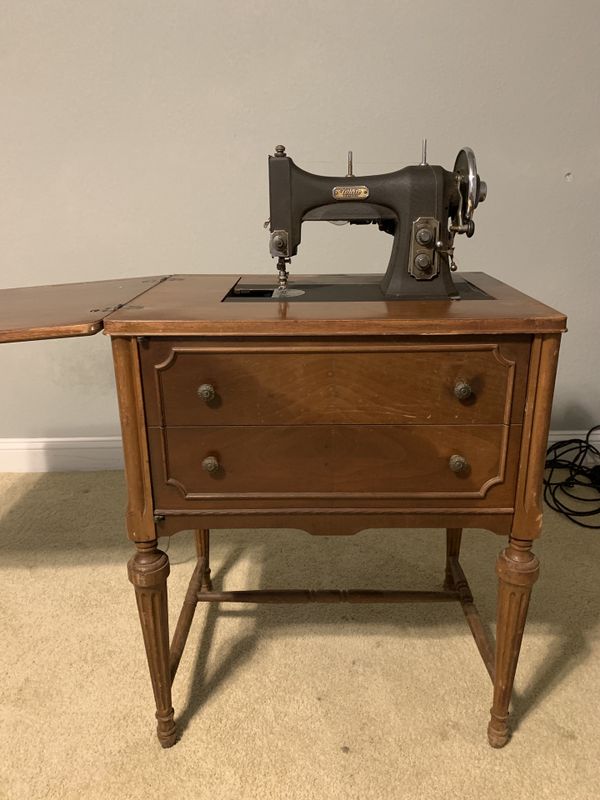 White Rotary Antique Sewing Machine Spring Table for Sale in Houston, TX OfferUp