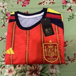 This is an XL ,XXL Spain national football team jersey in red and yellow. It features the team's crest embroidered on the chest. Made from a breathabl