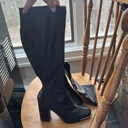 Knee high black boots