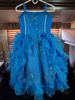 Girls size 8 Blue Ruffled Formal Pageant Dress