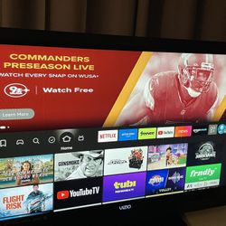 40 inch Vizio TV with fire stick and remotes