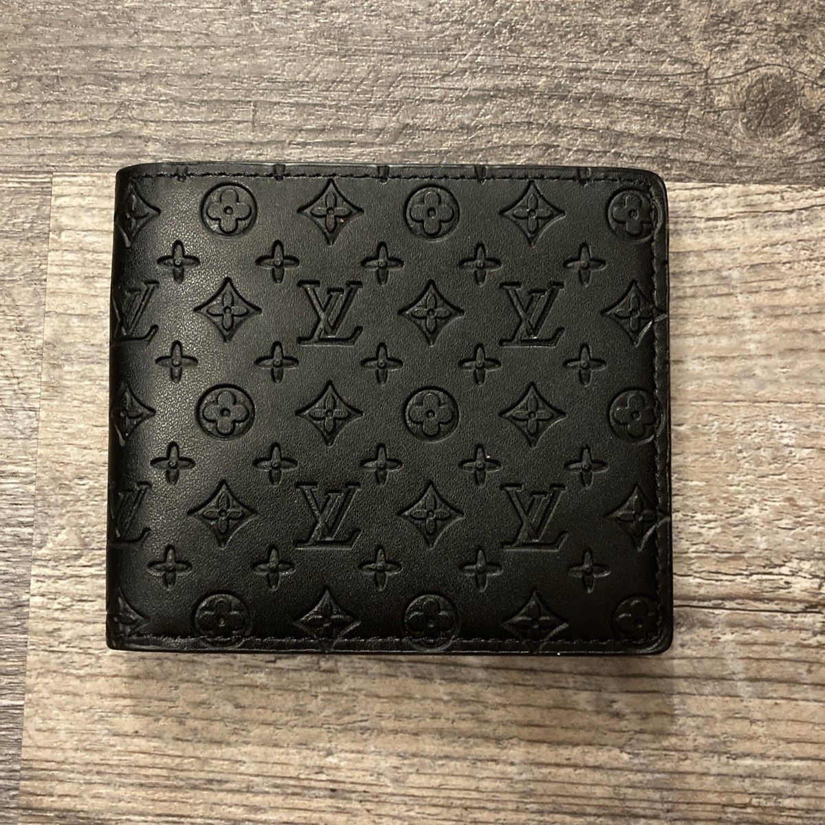 Black Embossed Louis Vuitton Wallet