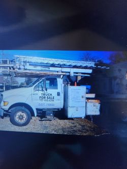 2 Bucket Trucks. Must Go