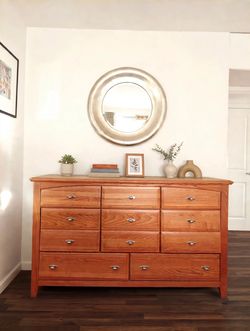 Solid wood oak 8-drawer dresser with a big round beveled mirror.
Dimension: 64 x 37X 18