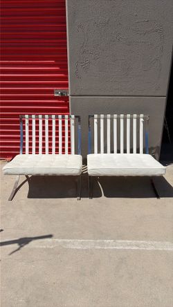 Victoria’s Secret vintage sold as a set of two white leather chair