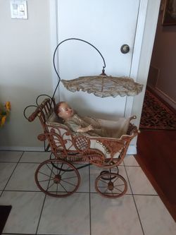 Antique Wicker Baby Doll Buggy