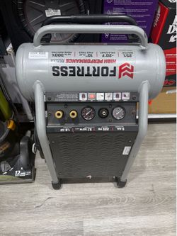 This is a Fortress 5-gallon, 225 PSI high-performance air compressor,