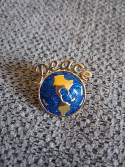 Avon Peace Globe Enamel Lapel Pin