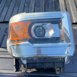 2014 GMC Sierra Headlight