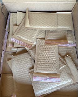 500 envelopes New Brown (or Kraft) poly bubble mailers in size W4" x H8" (Industry Standard #000