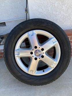Four 2008 g500 Tires & Rims (18 Inches)