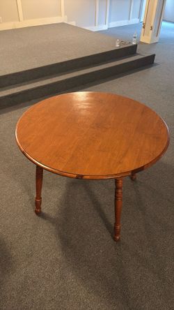 Round wood dining table