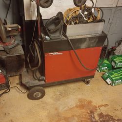 Welder and sand blast cabinet
