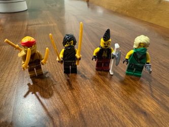 LEGO Set Of 4 Ninjago Minifigures With Weapons