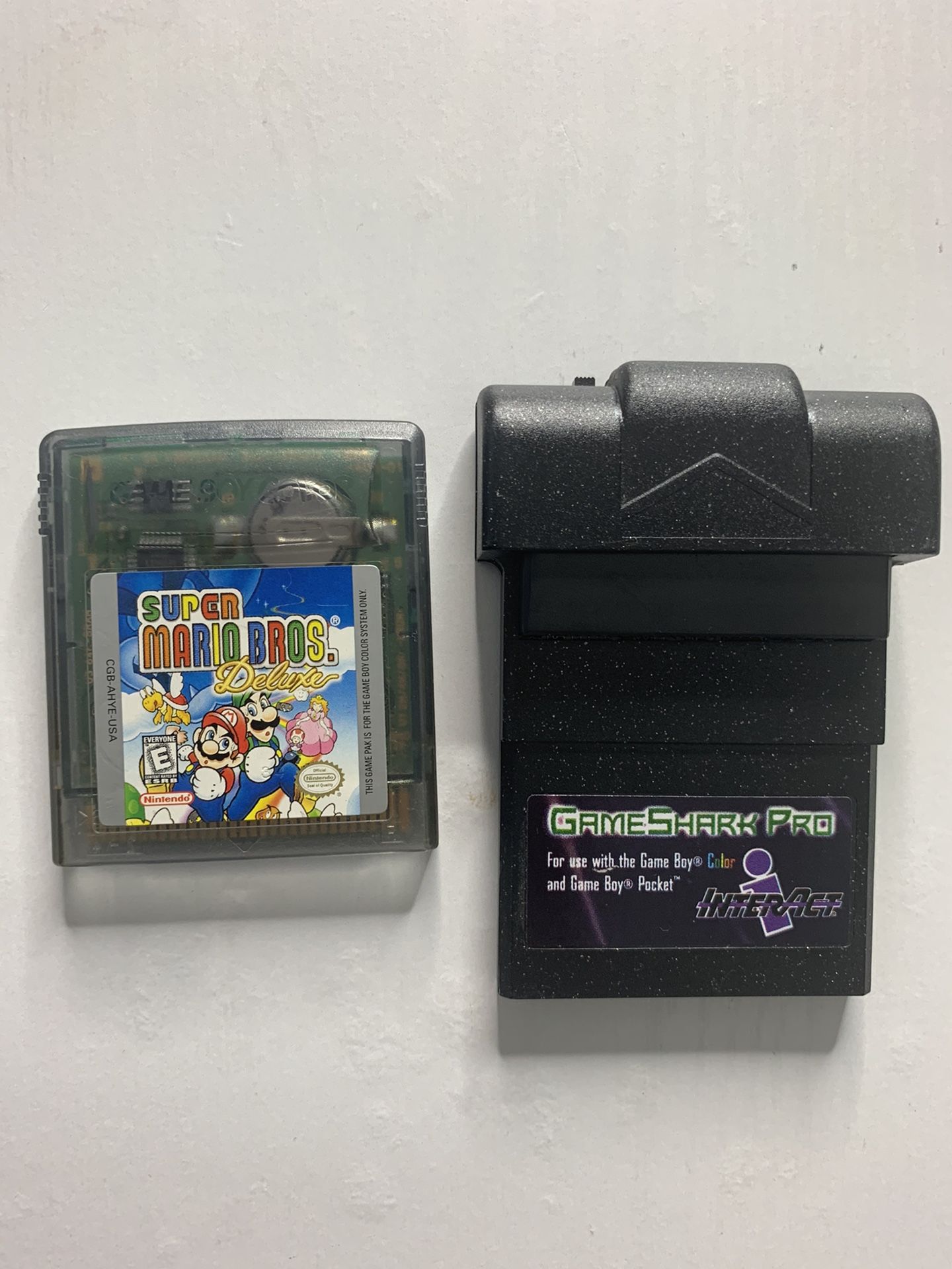 Super Mario and vintage gameshark bundle