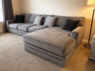 The Grey Couch Built for Two to Stretch Out. Not Squeeze In